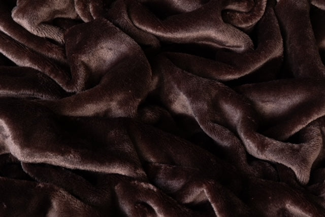 Plaid donker bruin stof close up